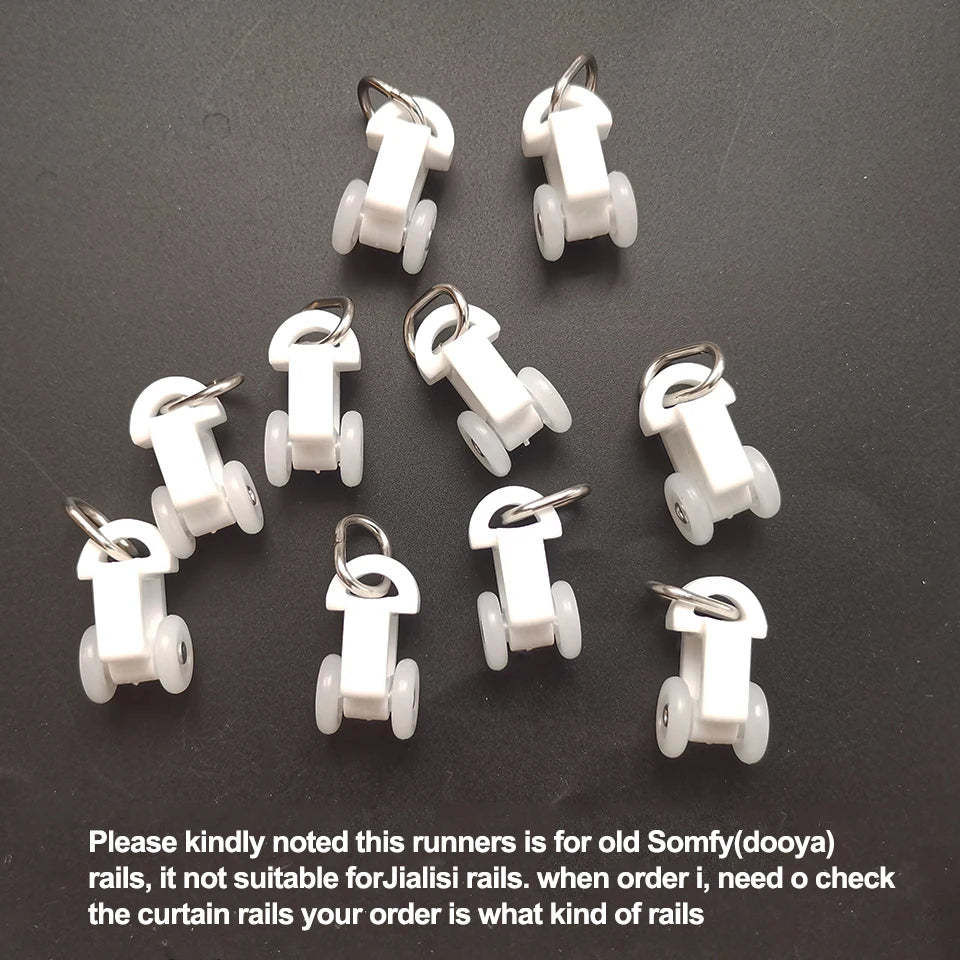 rideaux électriques runners blanc anneaux métalliques rail plastique lisse fonctionnels industriels