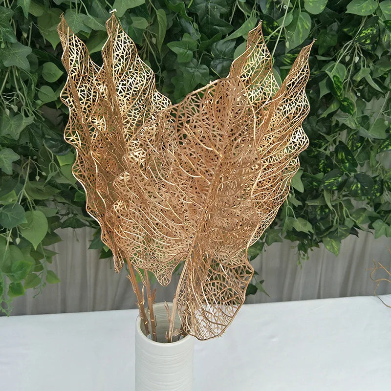 bouquet fleurs artificielles dorées feuilles stylisées graminées décoration intérieure moderne mariage fête