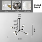 suspension lumineuse moderne or noir sphères transparentes scandinave