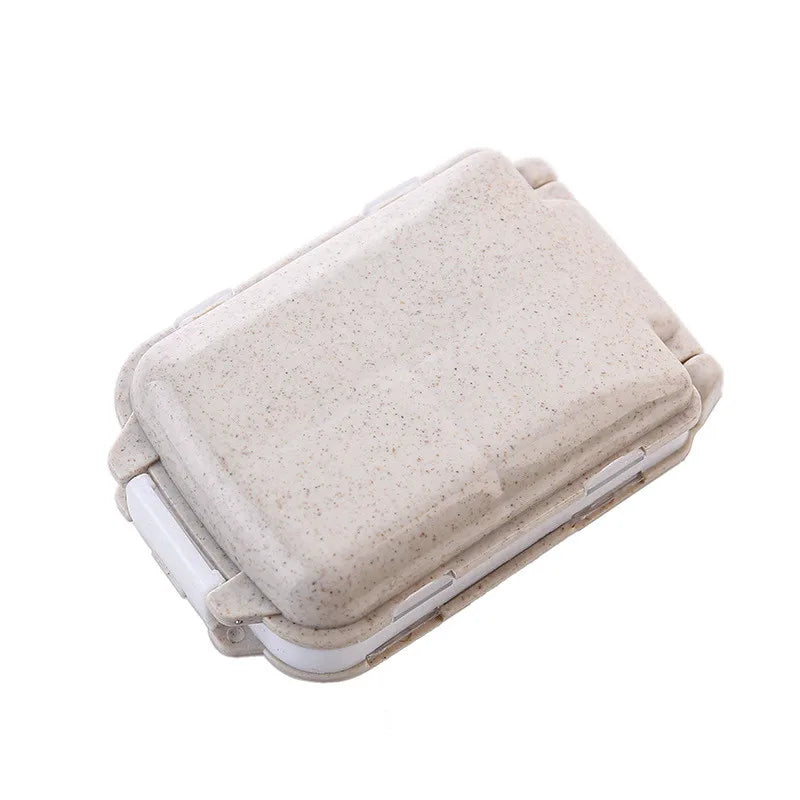 organisateur médicaments boîte pilules compartiments clips couleurs vert rose pratique compact