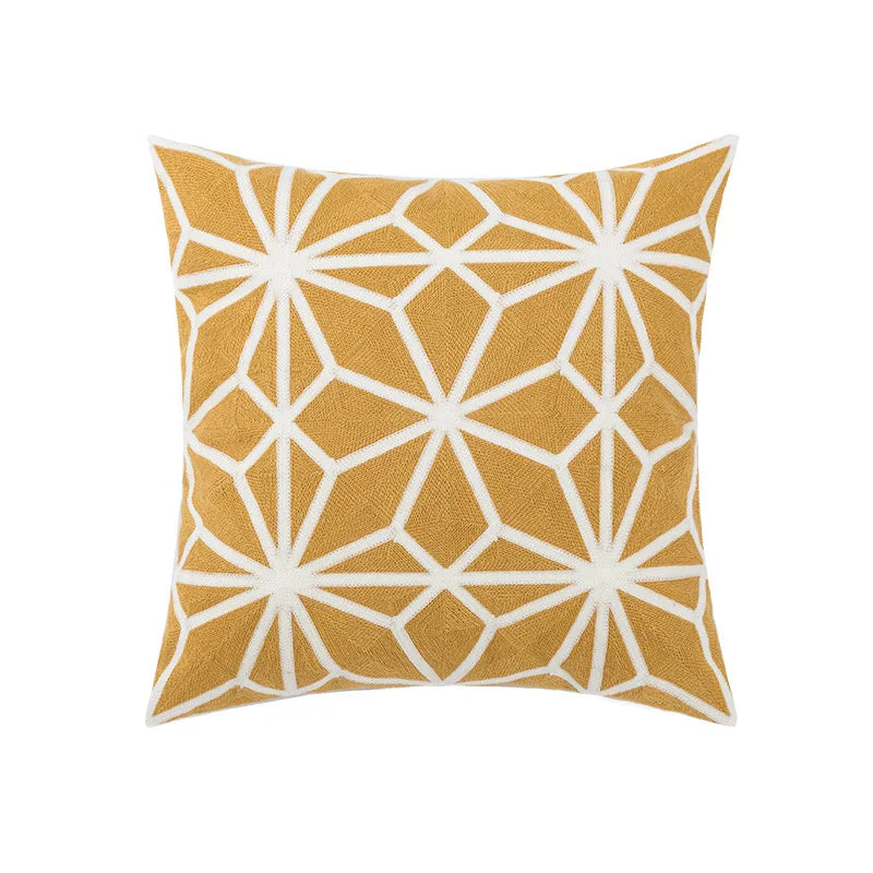 housse coussin brodée géométrique moderne fleur abstraite couleur beige blanc vert jaune décoration intérieure
