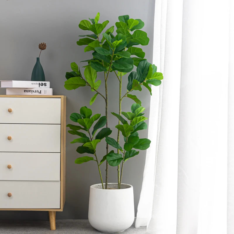 plantes artificielles arbres feuilles larges vert foncé intérieur décoration moderne minimalistes