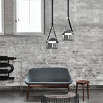 lampe suspendue moderne minimaliste noir gris transparent brillante chaîne métallique câble électrique chambre salon