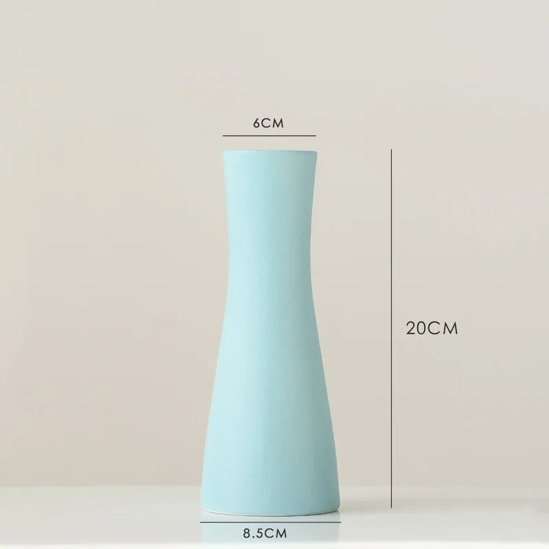 vases blancs modernes minimalistes céramique opaques fleurs artificielles table simple