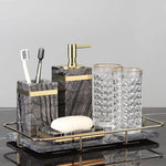 ensemble produits salle bain marbre gris moderne élégant brosse dents distributeur savon gobelet tube