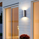 Applique murale LED noire allumée blanc chaud
