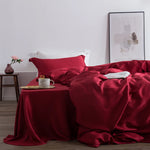 ensemble literie soie rose poudré drap housse taies oreillers minimaliste moderne élégant doux respirant