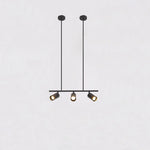 suspension lumineuse moderne noir doré tête brillante métal poli minimaliste