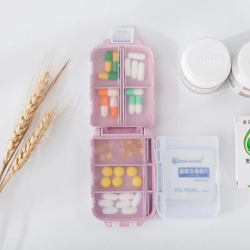 organisateur médicaments boîte pilules compartiments clips couleurs vert rose pratique compact