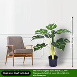 décoration extérieure plante artificielle verte moderne grande feuilles pot noir exposition sol festive
