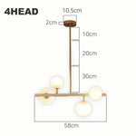 suspension lumineuse moderne or blanc boules translucides chaines interrupteur tactile