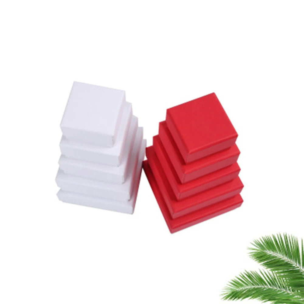 boîtes bijoux papier rouges blanches rangement colliers boucles oreilles bracelets bagues cadeaux noël