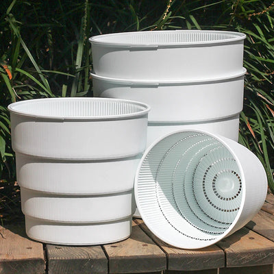 Cache-pot meshpot blanc avec trous d'air pour plantes intérieures