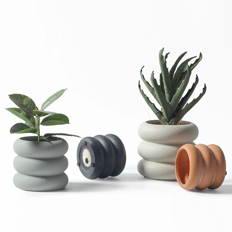 cache pot céramique moderne gris orange texture granuleuse fleur plante intérieure contemporain minimaliste