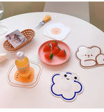 coasters cartoonaufs animaux souriants transparents orange blanc bleu respectueux environnement