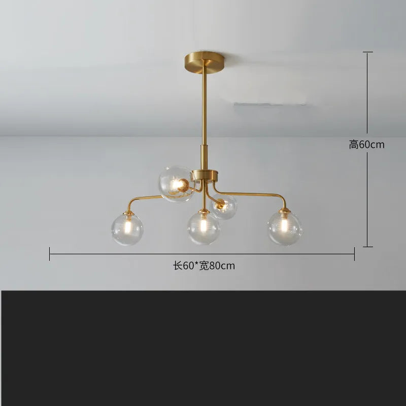 suspension lumineuse moderne or blanc sphères translucides structure métallique interrupteur tactile led