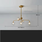 suspension lumineuse moderne or blanc sphères translucides structure métallique interrupteur tactile led