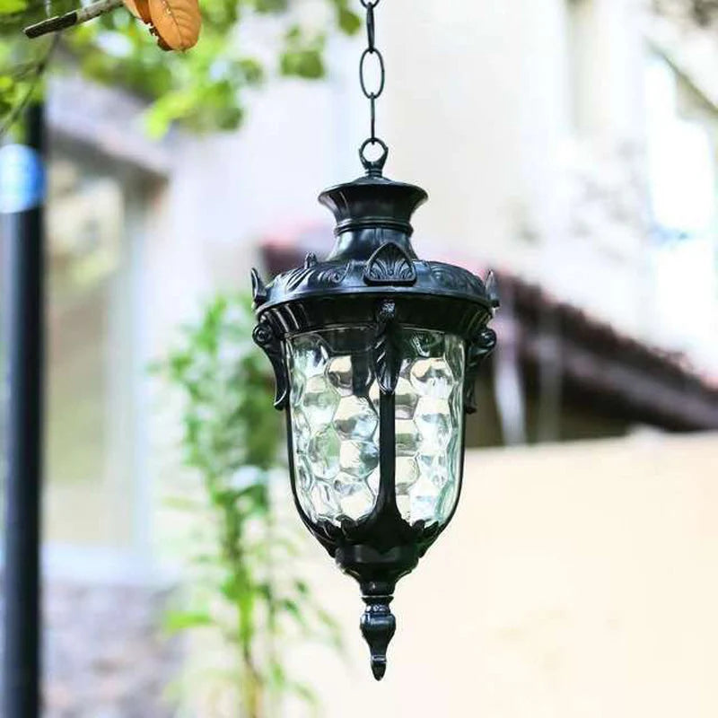 Lampe suspendue or noir verre translucide classique baroque chaîne texture métallique motif sculpté