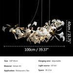 lampe suspendue feuilles gingko blanc doré contemporaine élégante salon chambre lumière chaînes porcelainière