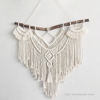 décoration murale macramé bohème blanc cassé beige clair tresses franges géométrique