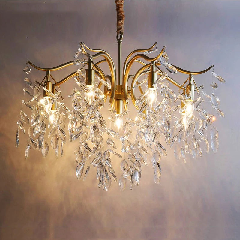 lustre moderne cristal K9 doré noir ampoules LED branches stylisées transparentes salon mariage