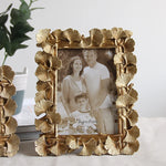 cadre photo ornement feuilles dorées texture métallique vintage fixation photo or antique gold silver
