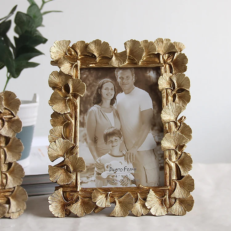 cadre photo ornement feuilles dorées texture métallique vintage fixation photo or antique gold silver