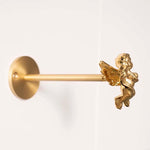 pince rideau dorée insectes anges détails sculptés quincaillerie fenêtre vintage opaques