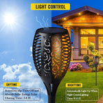 lampe torche solaire 96 led motif feuille moderne noire posée sol mur étancheextérieur