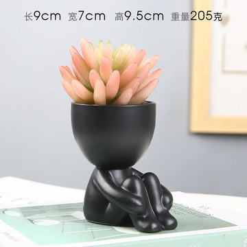 cache pot céramique blanc noir personnage assis contemporain plante succulente minimaliste ornement décoration artisanale