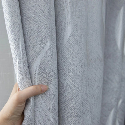 Rideau opaque gris élégant avec motif texturé, parfait pour la décoration intérieure et la protection contre la lumière, offrant une ambiance moderne et confortable à votre espace de vie.
