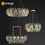 chandelier moderne luxueux transparent feuilles stylisées câbles métalliques doré argenté
