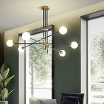 suspension lumineuse moderne noir doré sphères translucides led géométrique scandinave