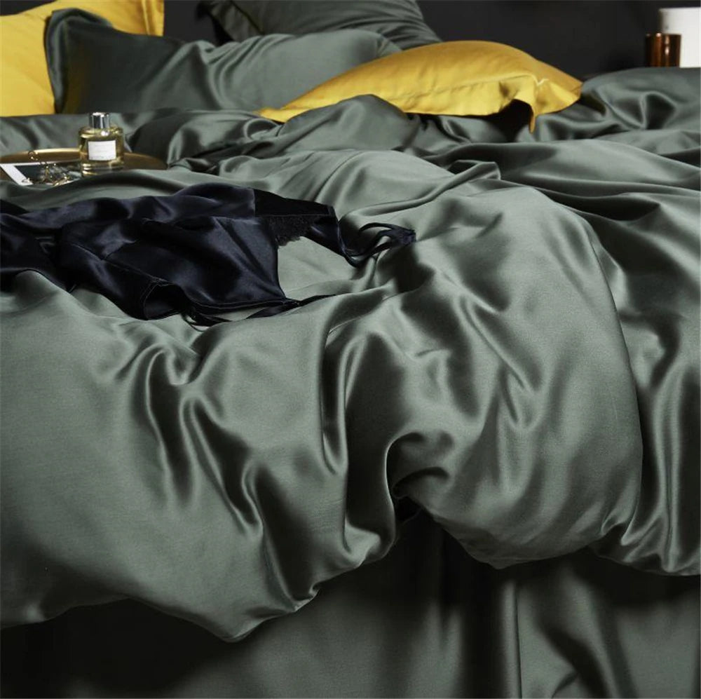 Drap plat en soie verte déployé sur un matelas