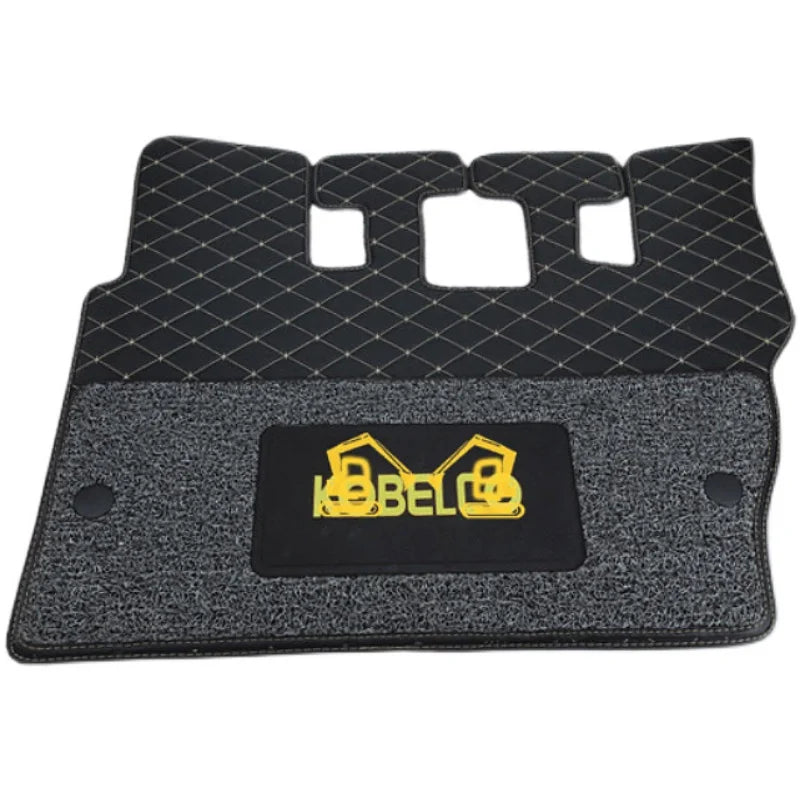 tapis sol noir rouge texturé losange granuleux industriel kobelco vehicule logo