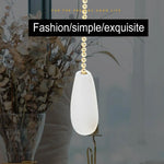 chaînes pull bois blanc brun noyer argent darkwood ventilateur lampe minimaliste