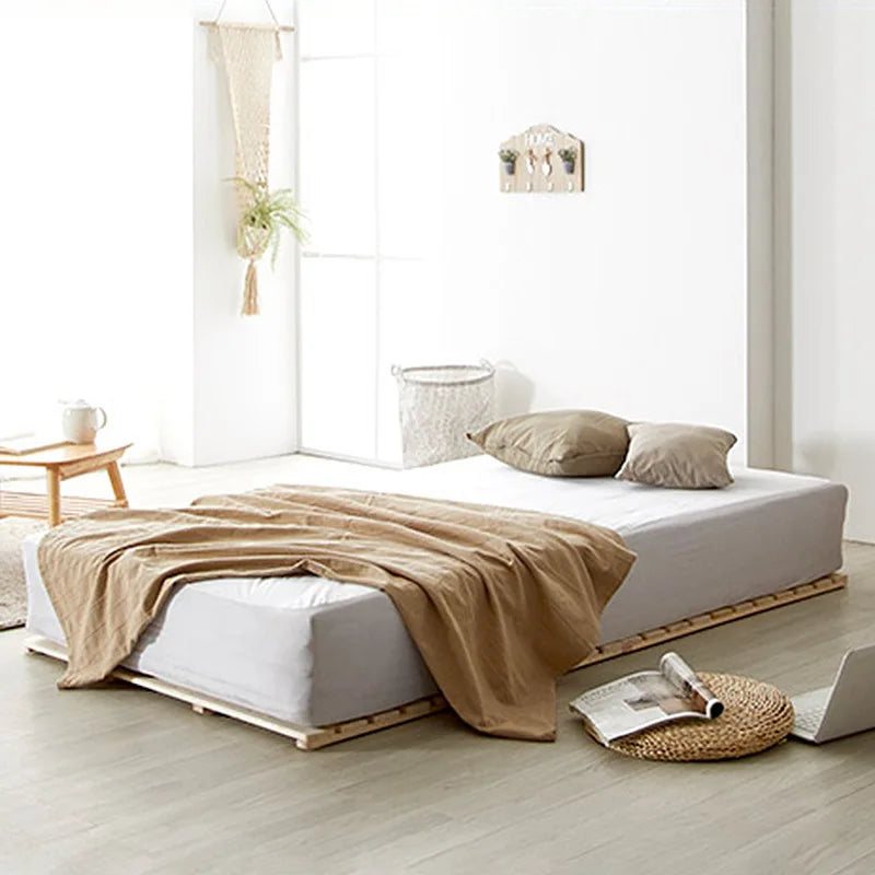 Tête de lit installée sur un lit Queen dans une chambre zen