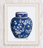 Élégant vase bleu décoré de fleurs blanches stylisées dans un motif floral gracieux.