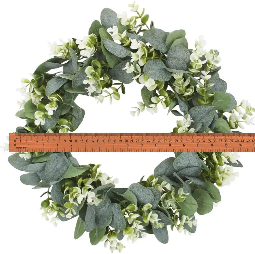 couronne artificielle feuilles vertes fleurs blanches naturelle rustique extérieur intérieur décoration festive porte salon