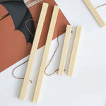 cadres photo bois clair minimaliste suspension murale affiches personnalisées floraux geometriques scandine