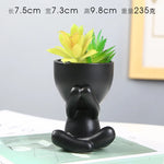 cache pot céramique blanc noir personnage assis contemporain plante succulente minimaliste ornement décoration artisanale