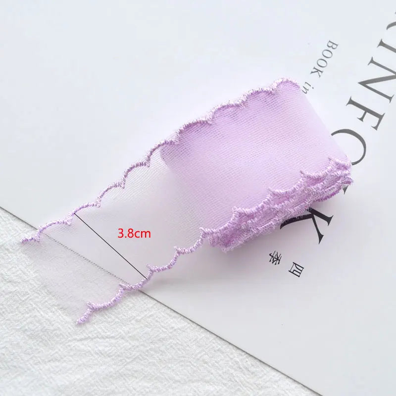 ruban dentelle fine polyester coton rose clair gris vert pâle blanc violet translucide élégant