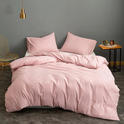Housse de couette rose 200x220 cm sur un lit King Size