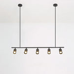 suspension lumineuse moderne noir doré tête brillante métal poli minimaliste