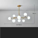 suspension lumineuse moderne or blanc sphères translucides structure métallique interrupteur tactile led