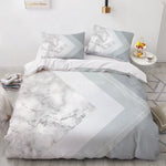 Housse de couette marbre blanc doré pliée