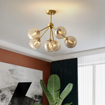 lustre moderne lumières doré sphères transparentes art déco contemporain led chambre salon