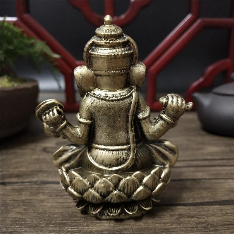statue ganesha bronze détaillée motifs traditionnels bouddhiste artisanat décoration intérieure figure éléphant