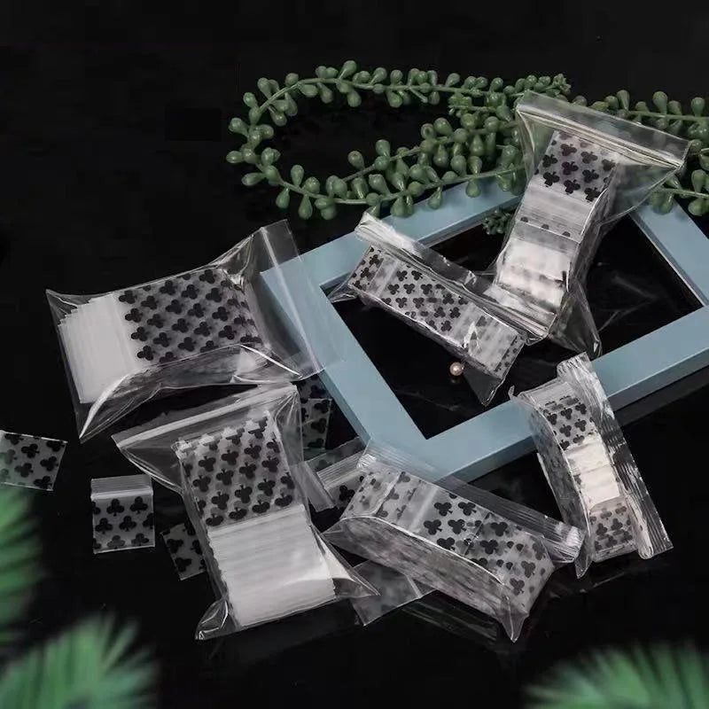 sachets plastique transparents motif cœurs noirs fermeture glissière pratique utilitaire variété tailles