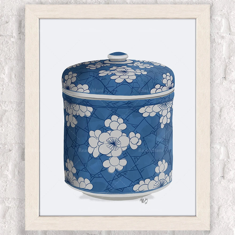 Pot en céramique bleu avec un motif floral décoratif.